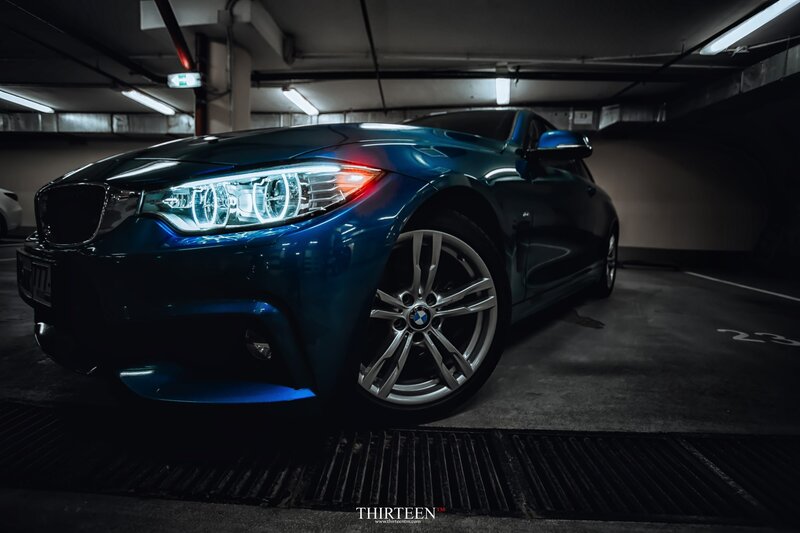 Blue Bmw Car — Dramatic, Night, Photograph, Parking Garage