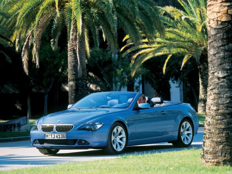 Blue BMW convertible on a sunny day