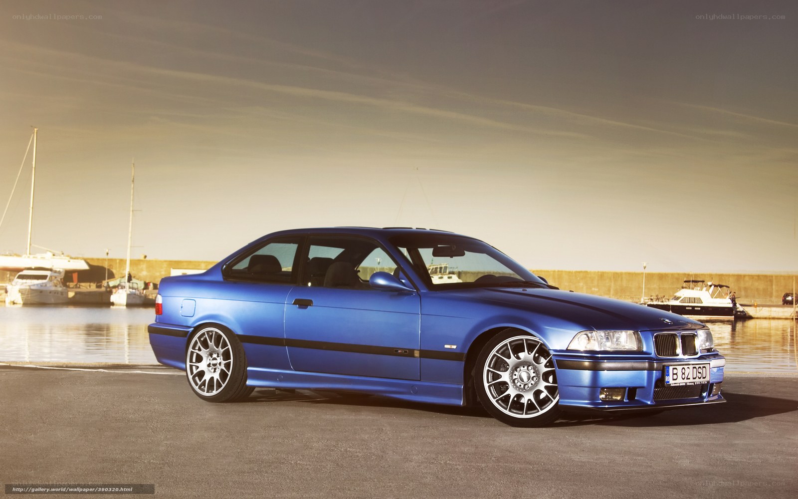 Blue BMW coupe at harbor