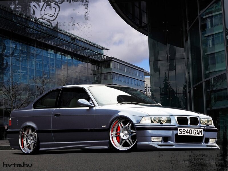 blue bmw coupe in city