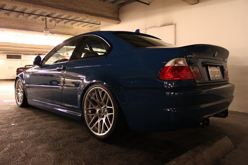 blue bmw coupe in garage
