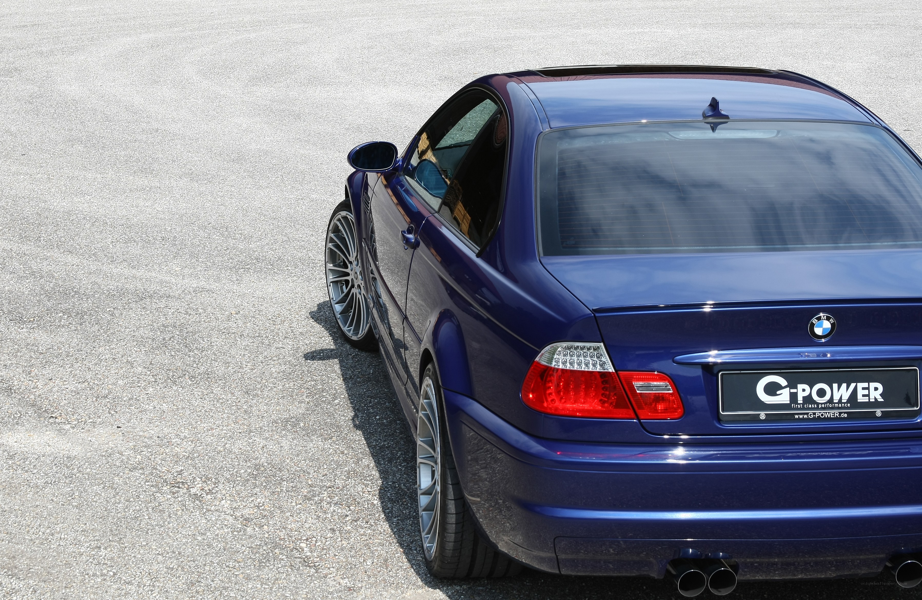 blue bmw coupe rear view