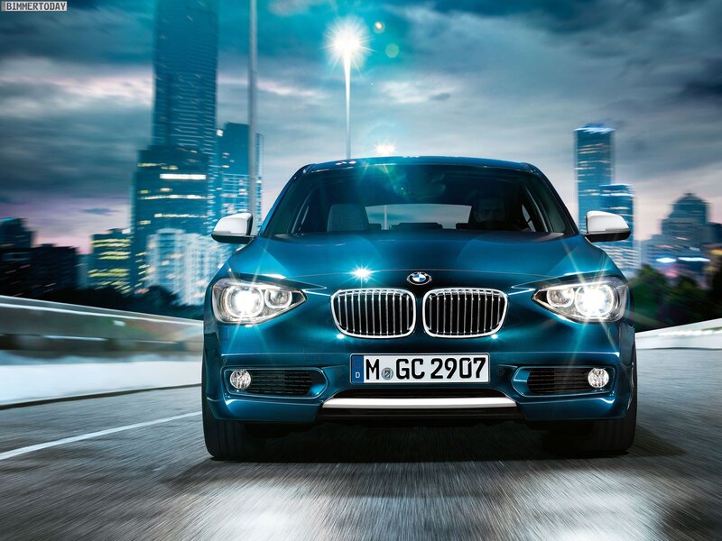 Blue BMW driving in city