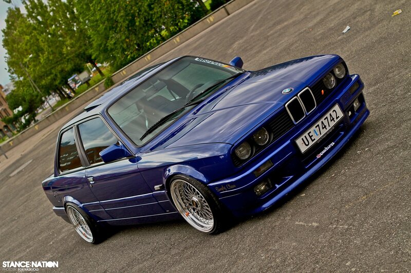 blue bmw e30 on asphalt