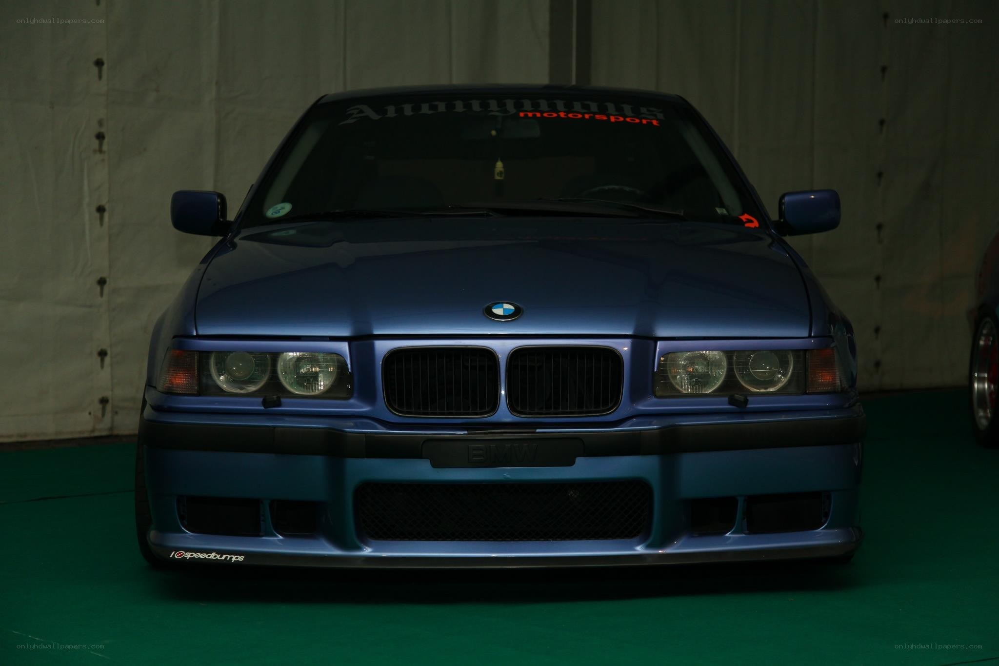 blue bmw e36 front view