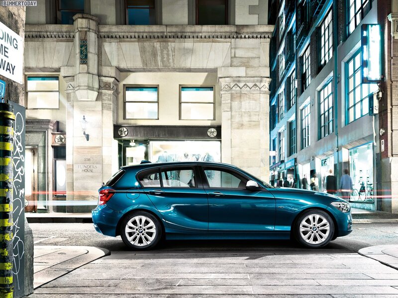 Blue BMW in city street