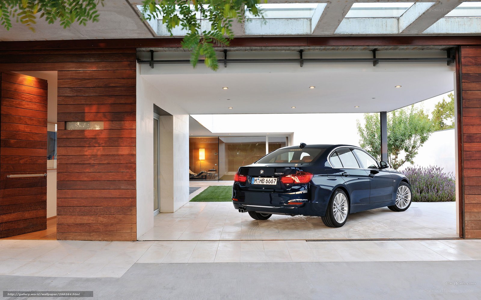 Blue BMW in modern garage