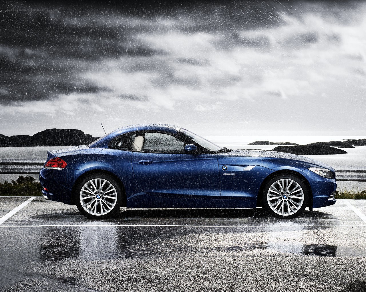 Blue BMW in the rain