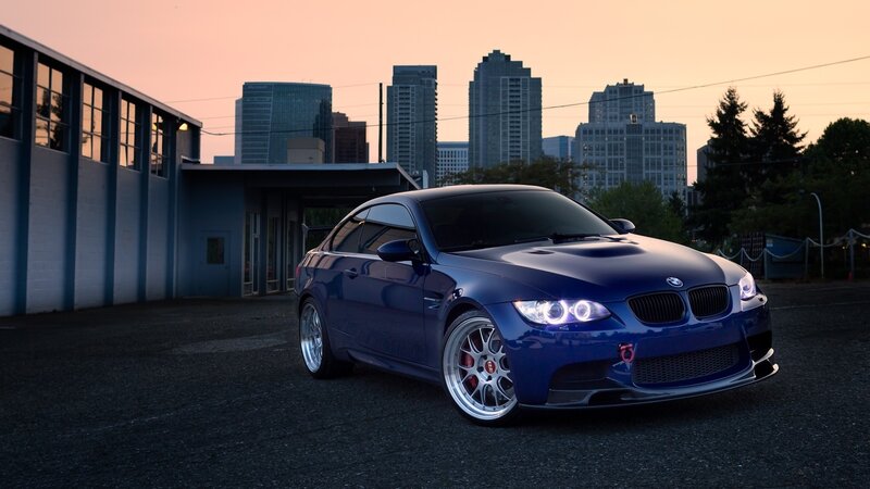 blue bmw m3 at dusk