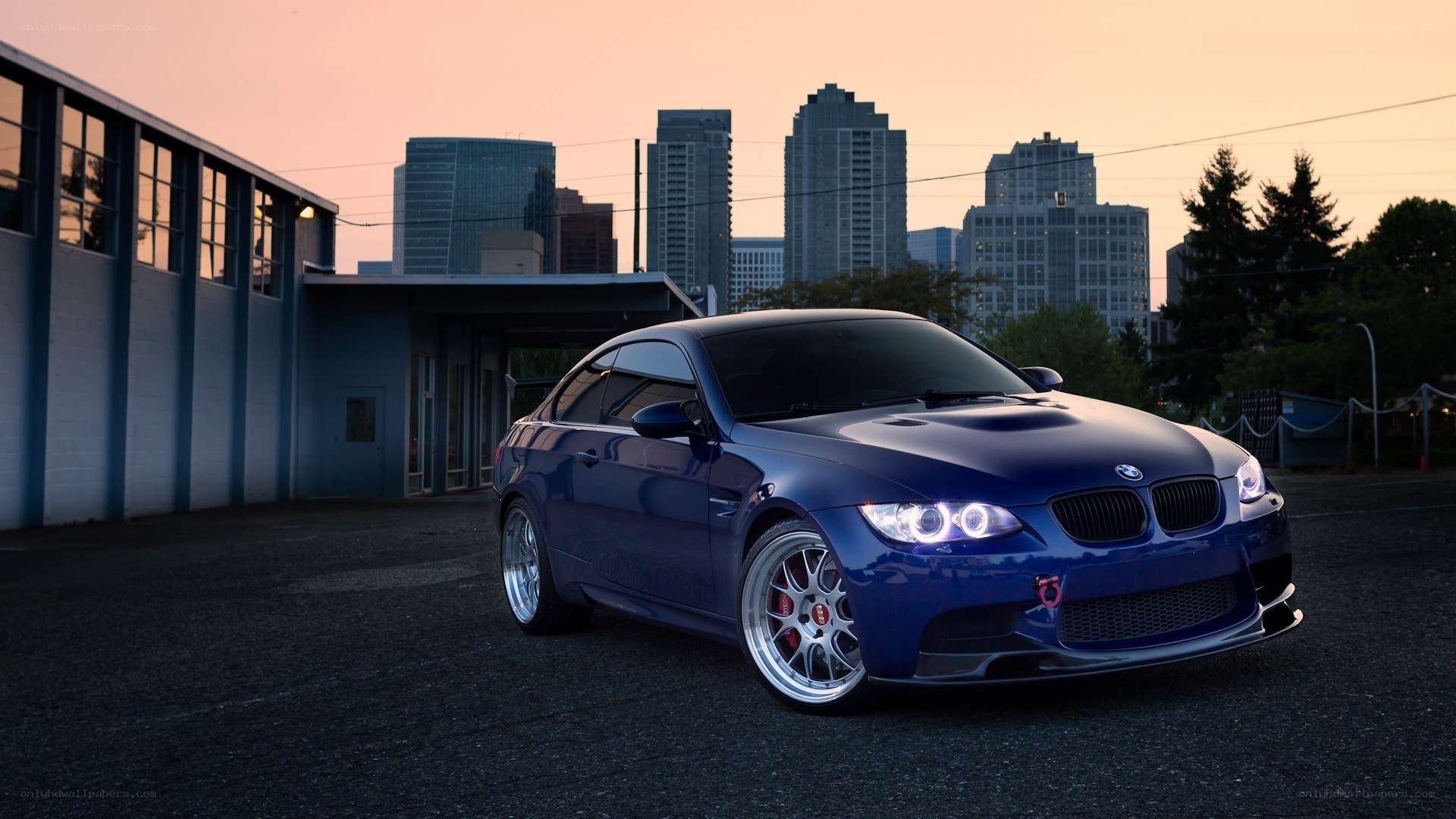 blue bmw m3 at dusk