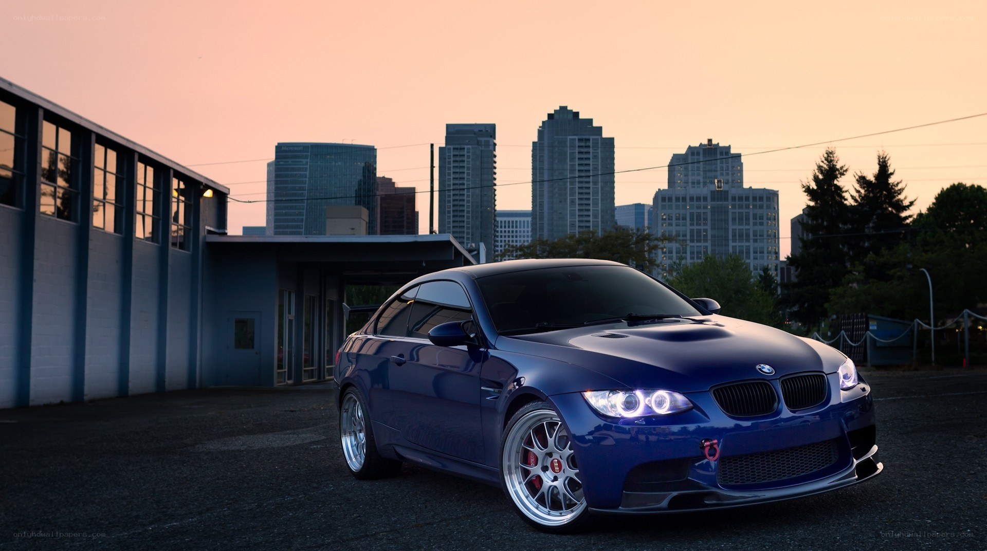 blue bmw m3 at sunset