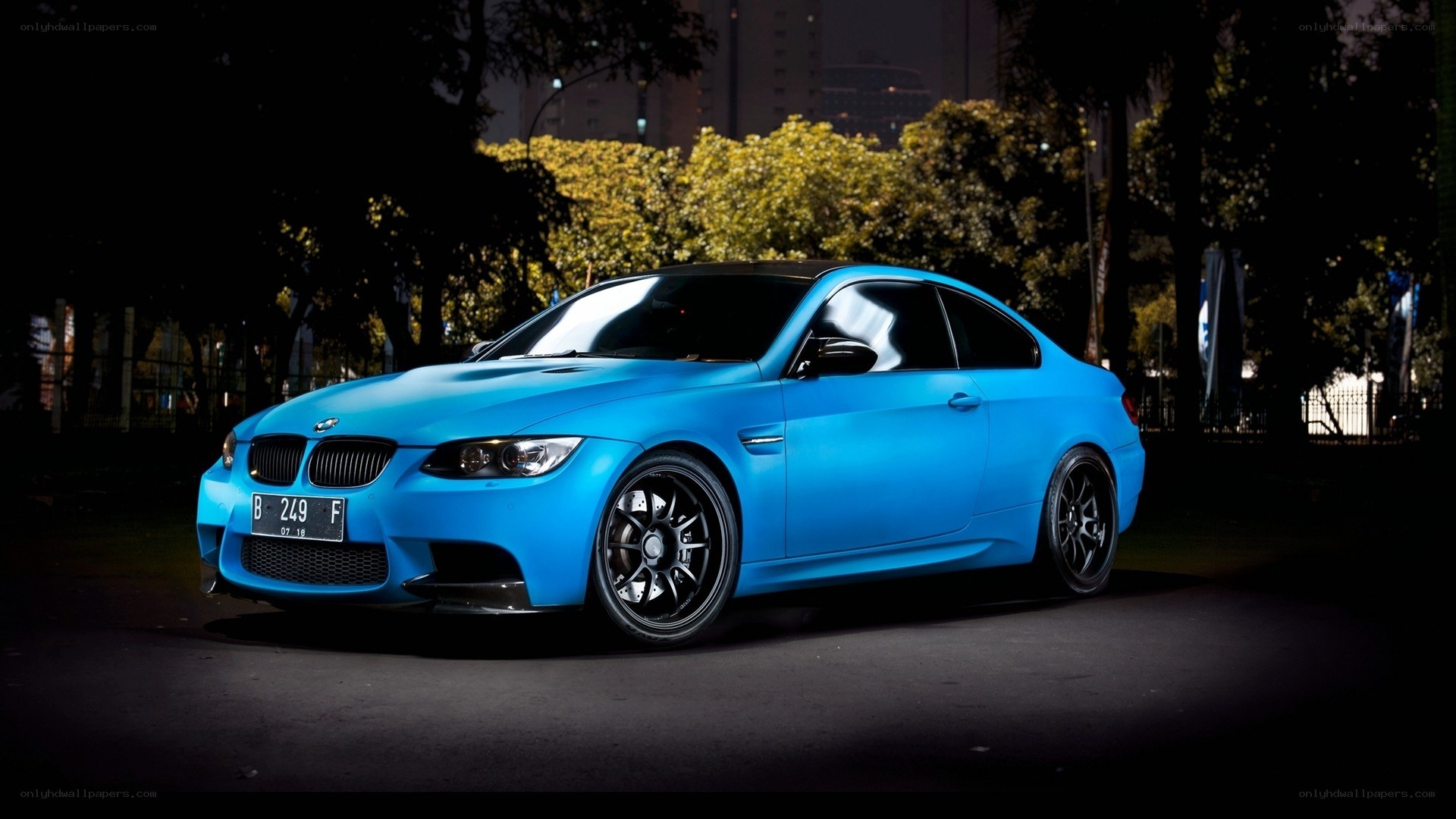 blue bmw m3 coupe at night