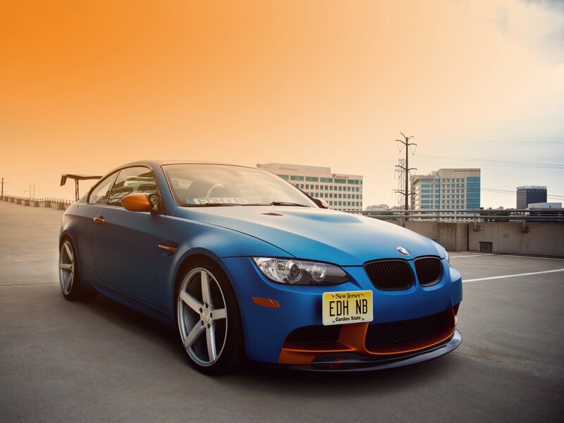 Blue BMW M3 Coupe — Dramatic, Sunset, Photograph, City Buildings