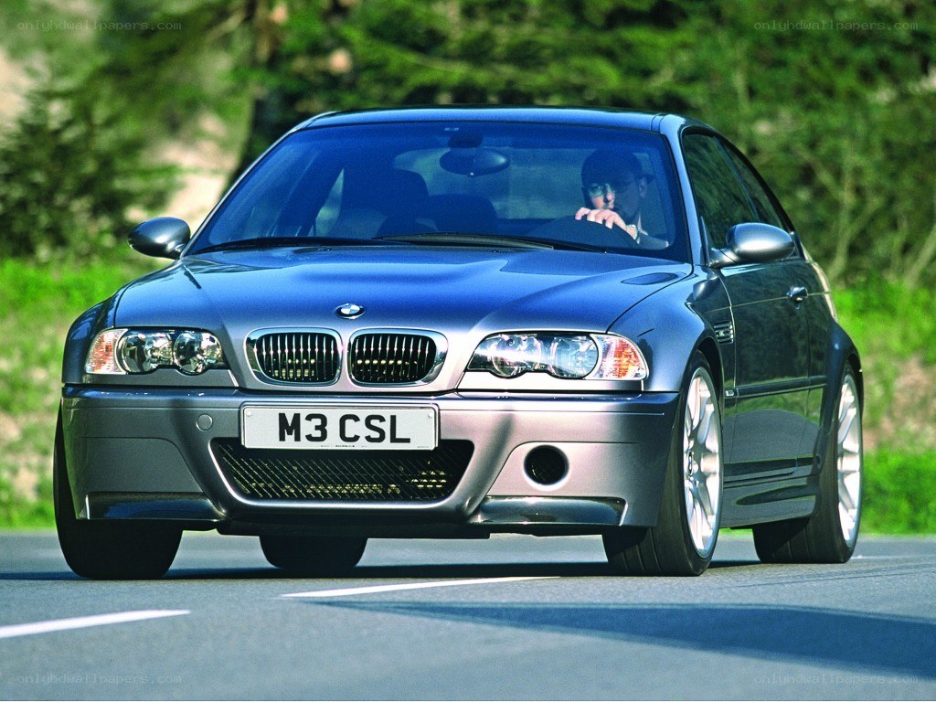 Blue BMW M3 CSL on a road