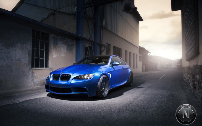Blue BMW M3 in an alley