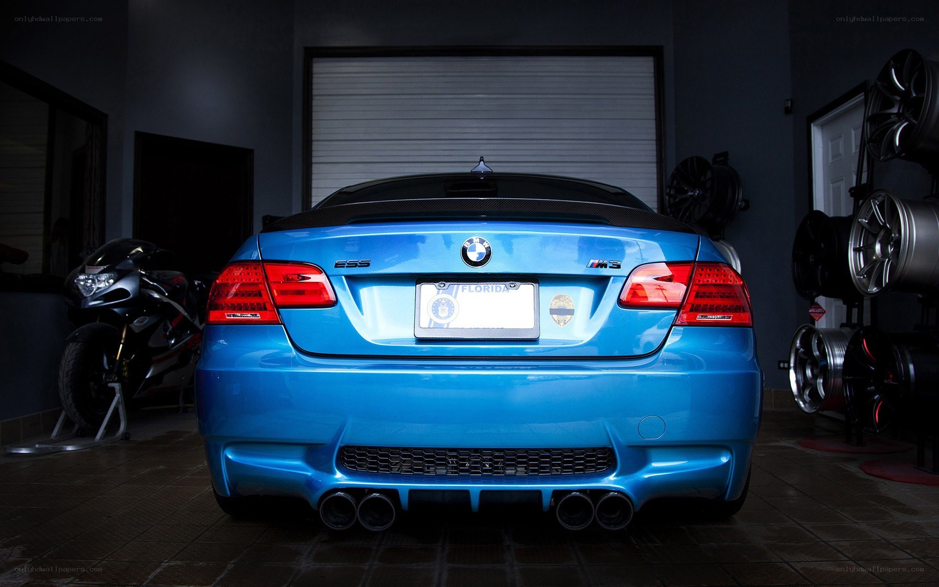 blue bmw m3 in garage
