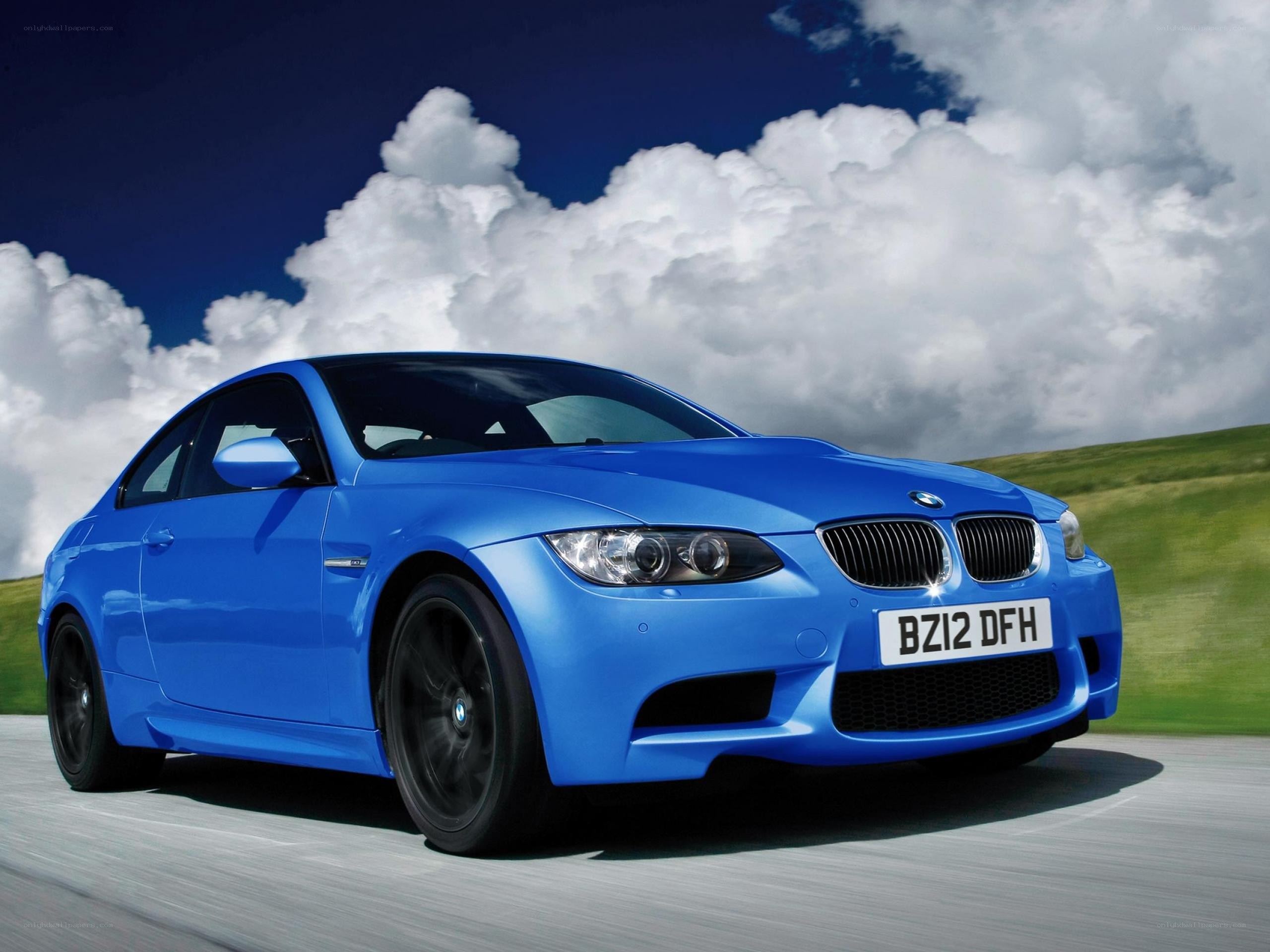 Blue BMW M3 in motion