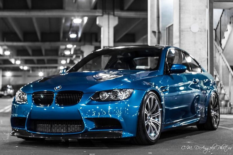 Blue BMW M3 in parking garage