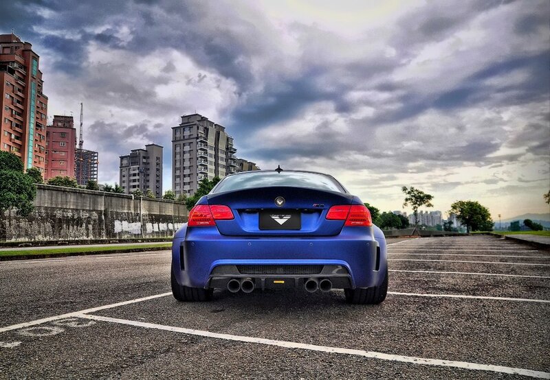 Blue BMW M3 in parking lot