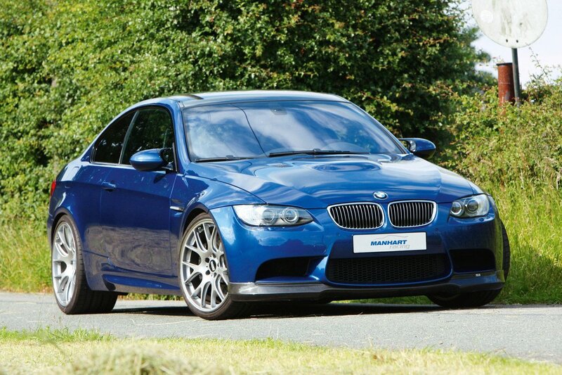 Blue BMW M3 on a country road
