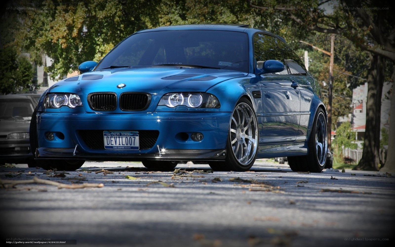 Blue BMW M3 on a street