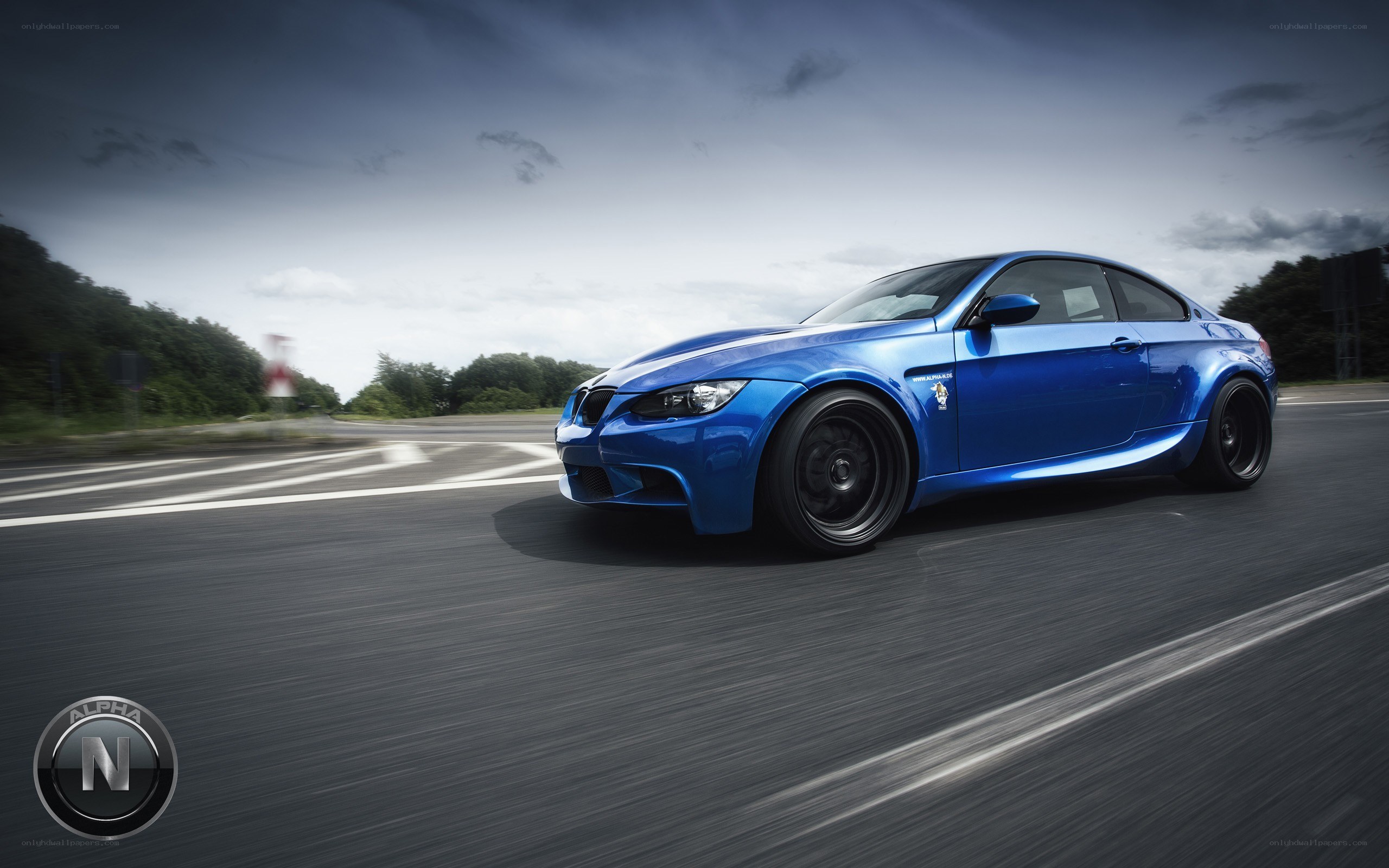 blue bmw m3 on road
