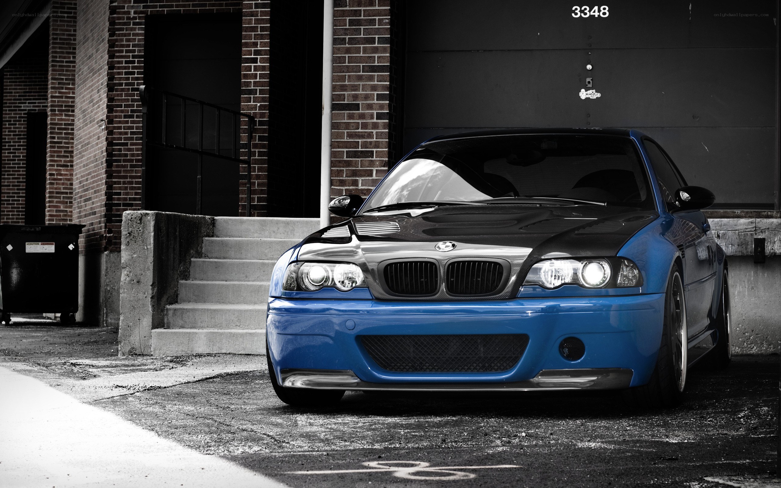 blue bmw m3 parked outside