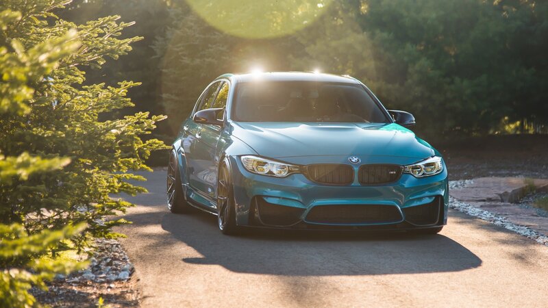 Blue BMW M3 Sedan — Teal