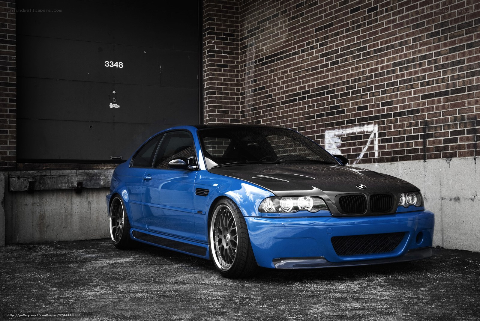 Blue BMW M3 with carbon hood
