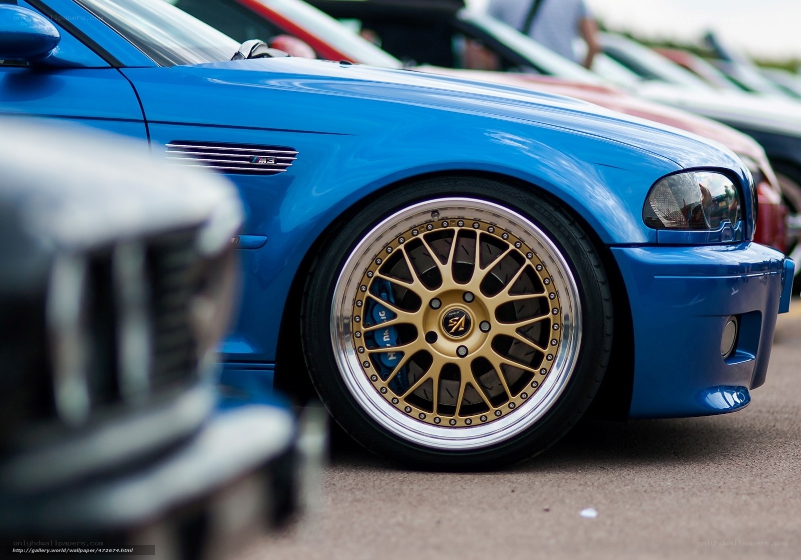 blue bmw m3 with gold wheels
