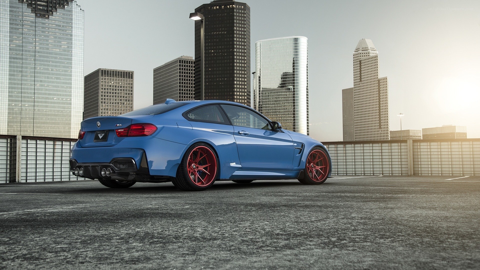 Blue BMW M4 in city