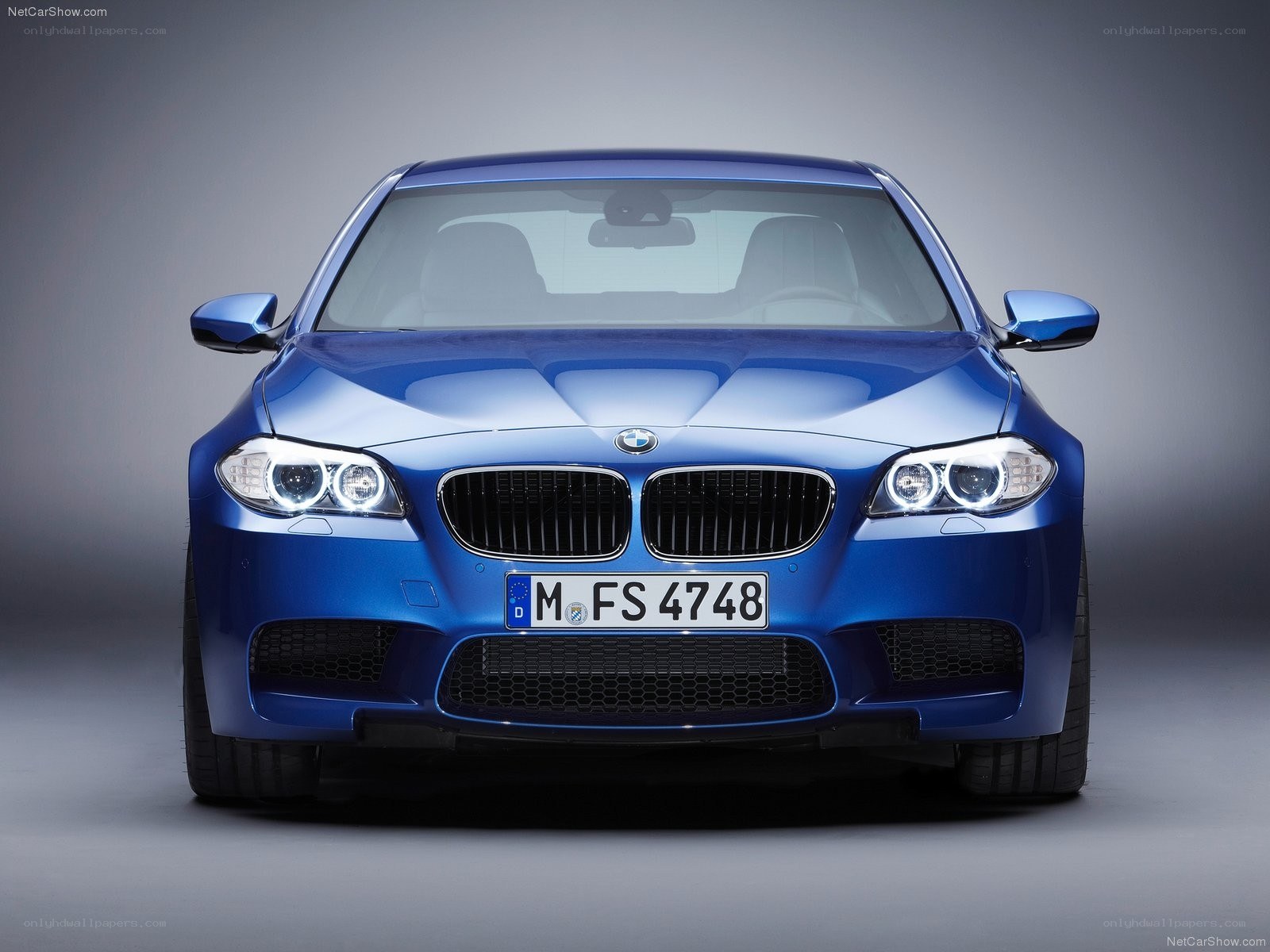 Blue BMW M5 front view