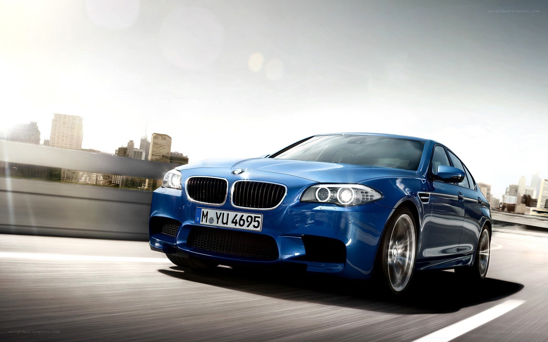 Blue BMW M5 in motion