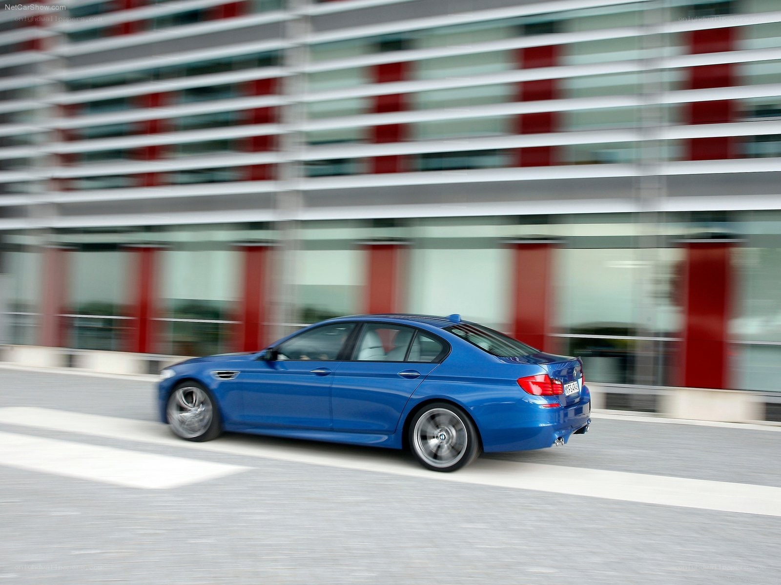 Blue BMW M5 in motion