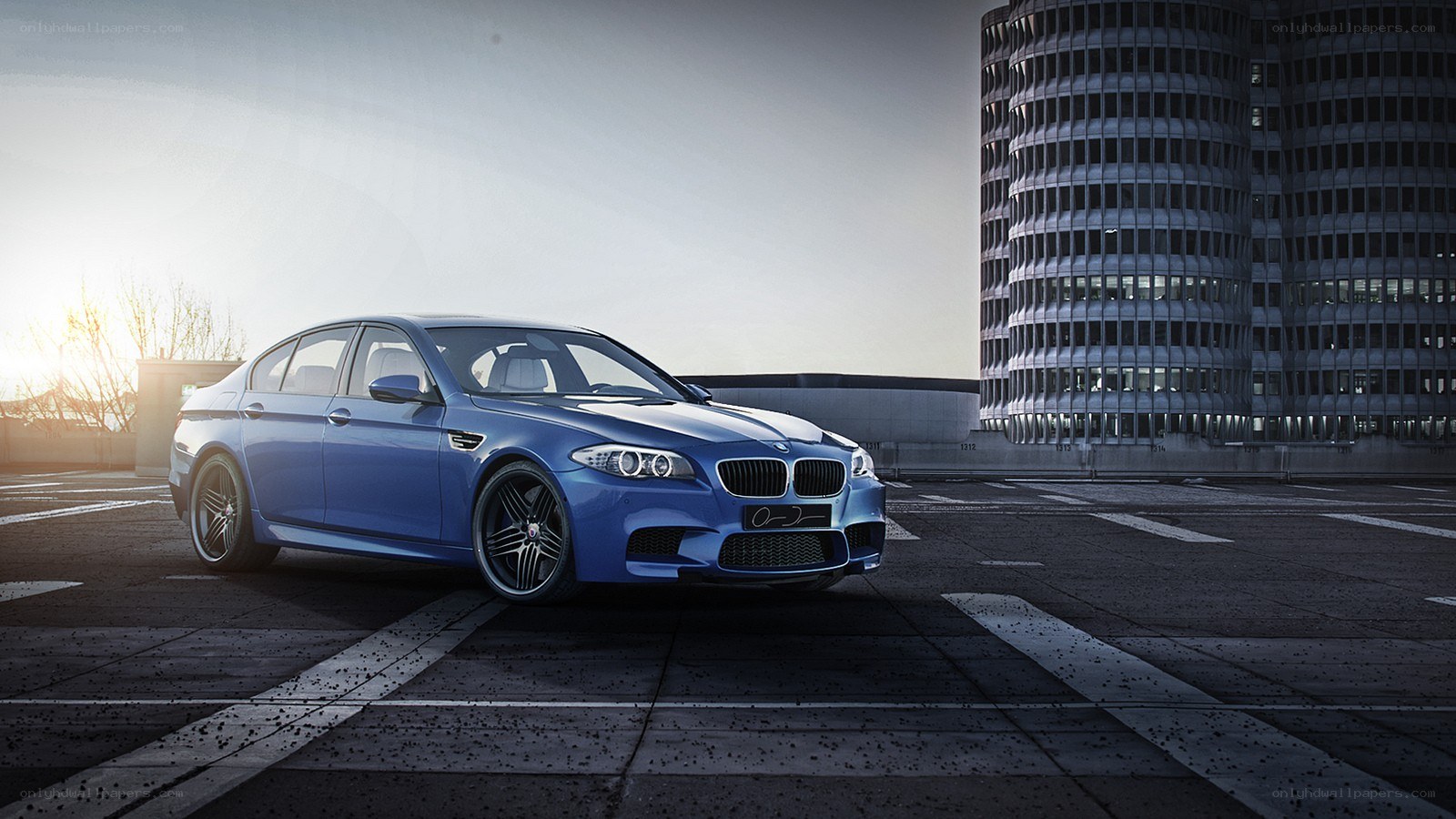 Blue BMW M5 in urban setting