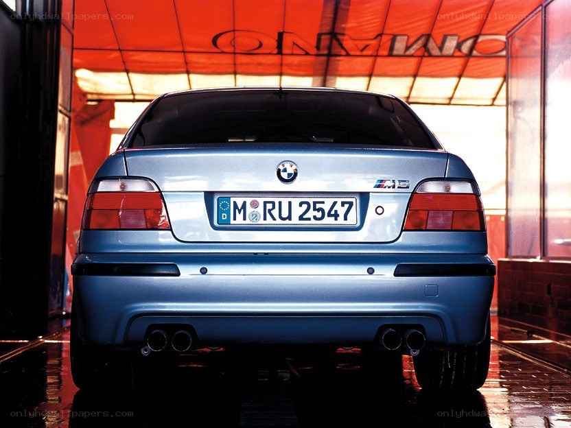blue bmw m5 rear view