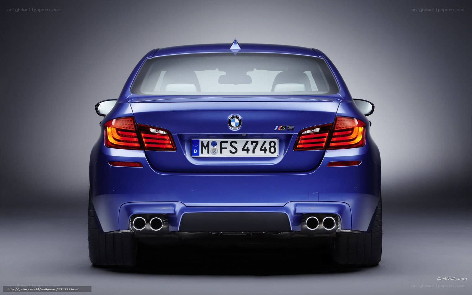 blue bmw m5 rear view
