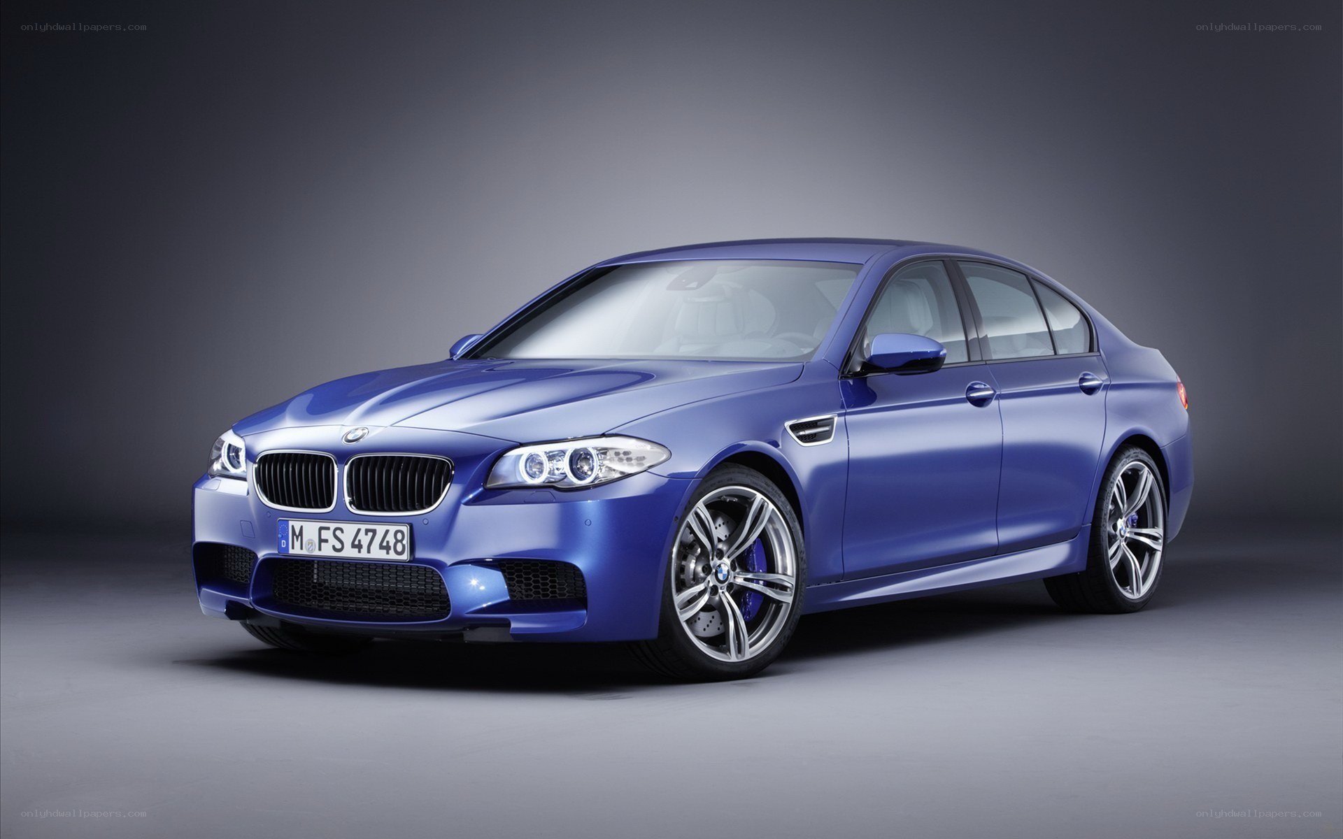 blue bmw m5 sedan