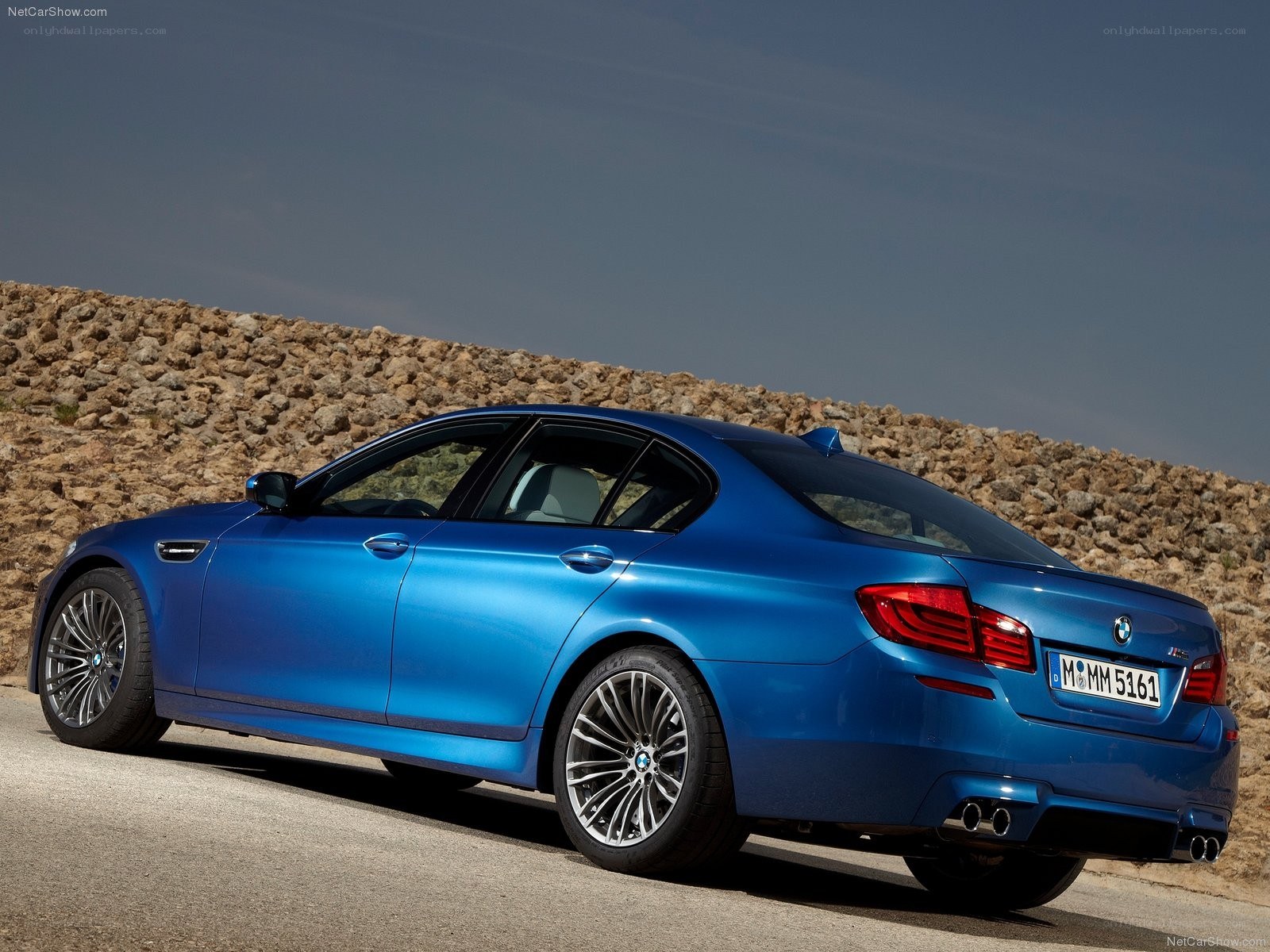 blue bmw m5 sedan