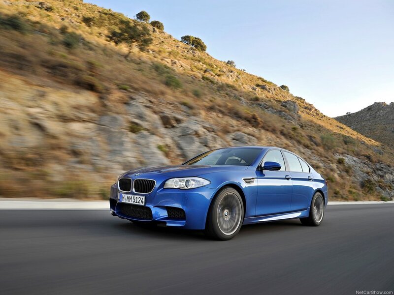 Blue BMW M5 Sedan — Dynamic, Afternoon, Photograph