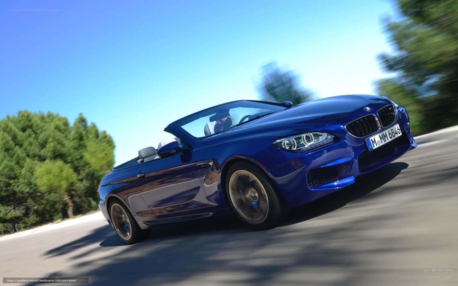 blue bmw m6 convertible driving