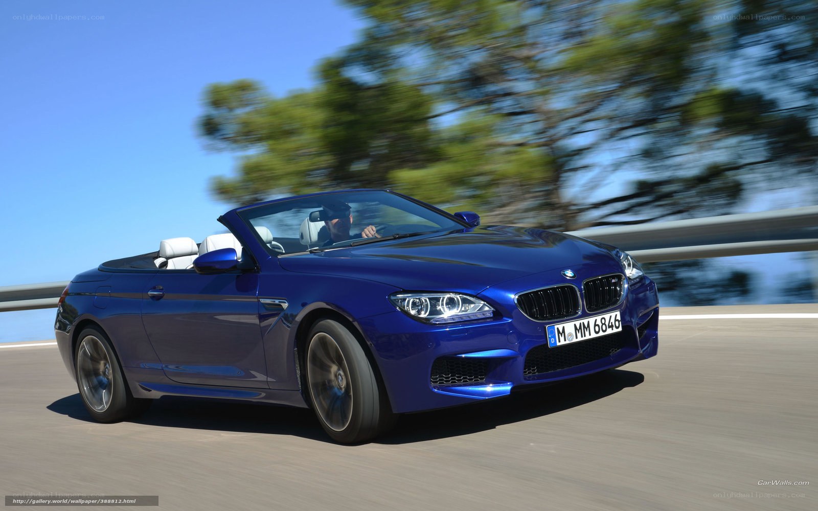 Blue BMW M6 Convertible in Motion