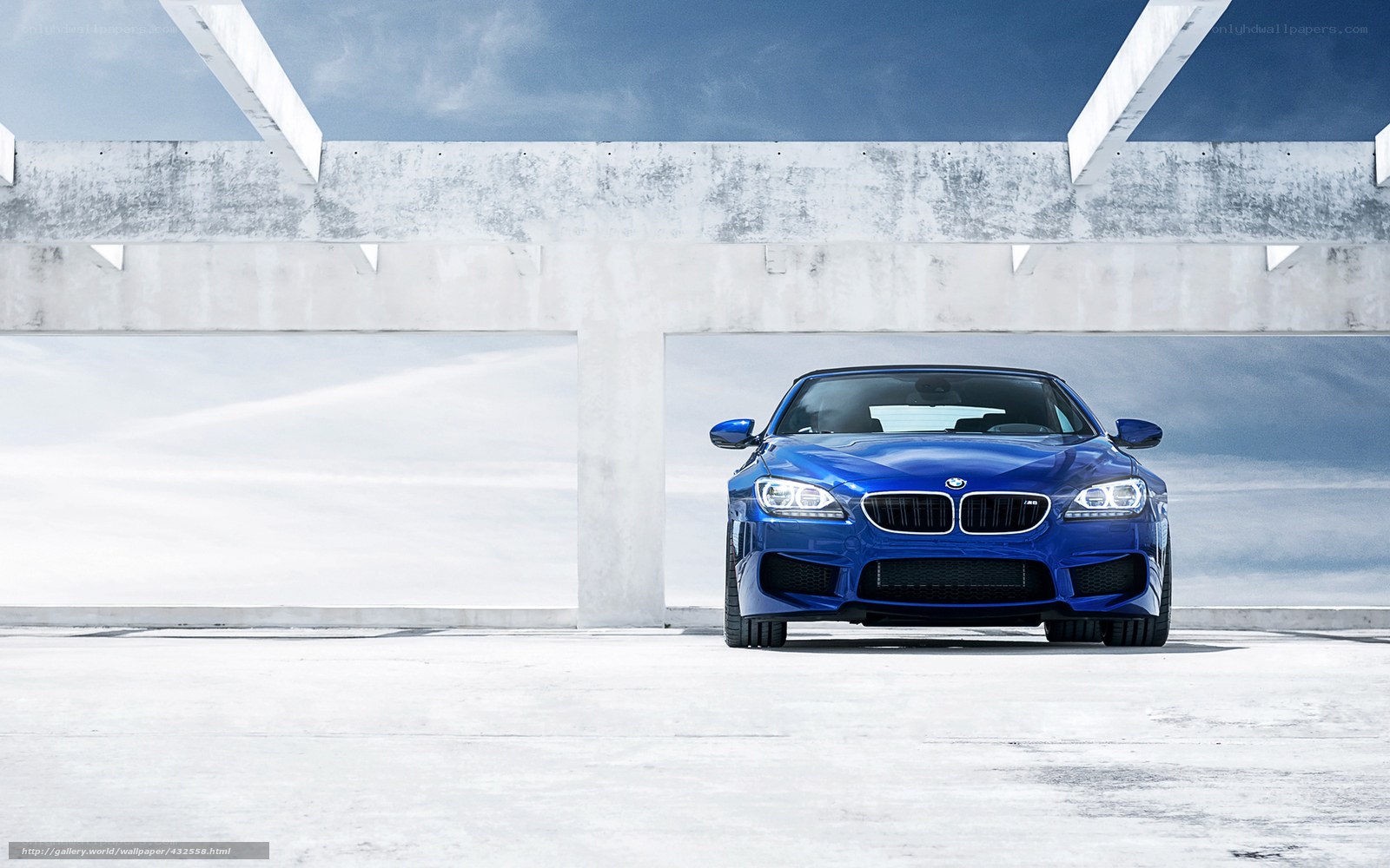 Blue BMW M6 in concrete structure