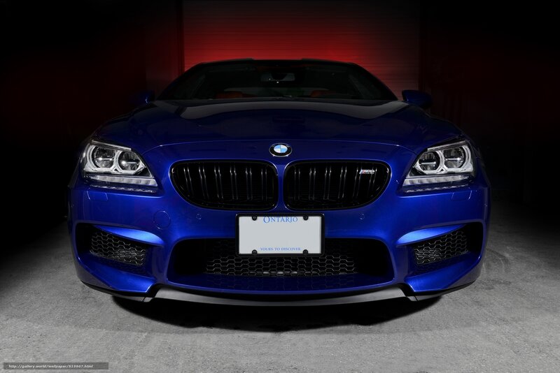 Blue BMW M6 in garage