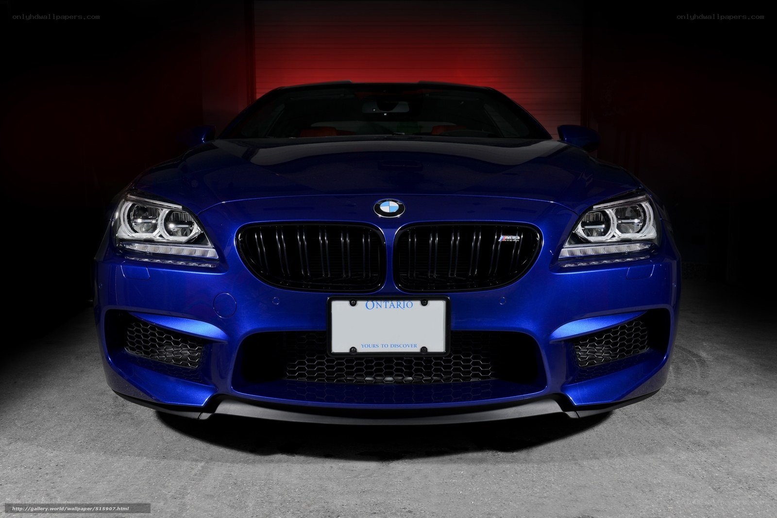 Blue BMW M6 in garage