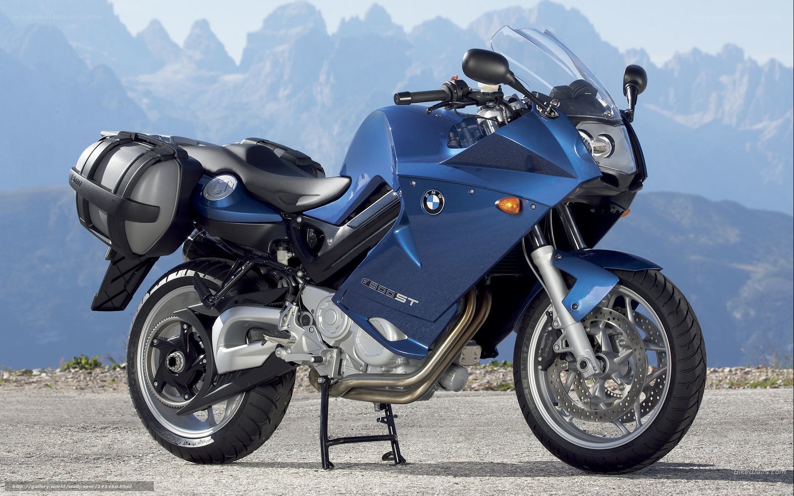 Blue BMW motorcycle in mountains