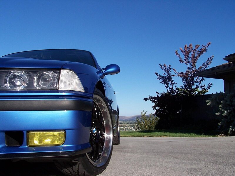 Blue BMW on a sunny day