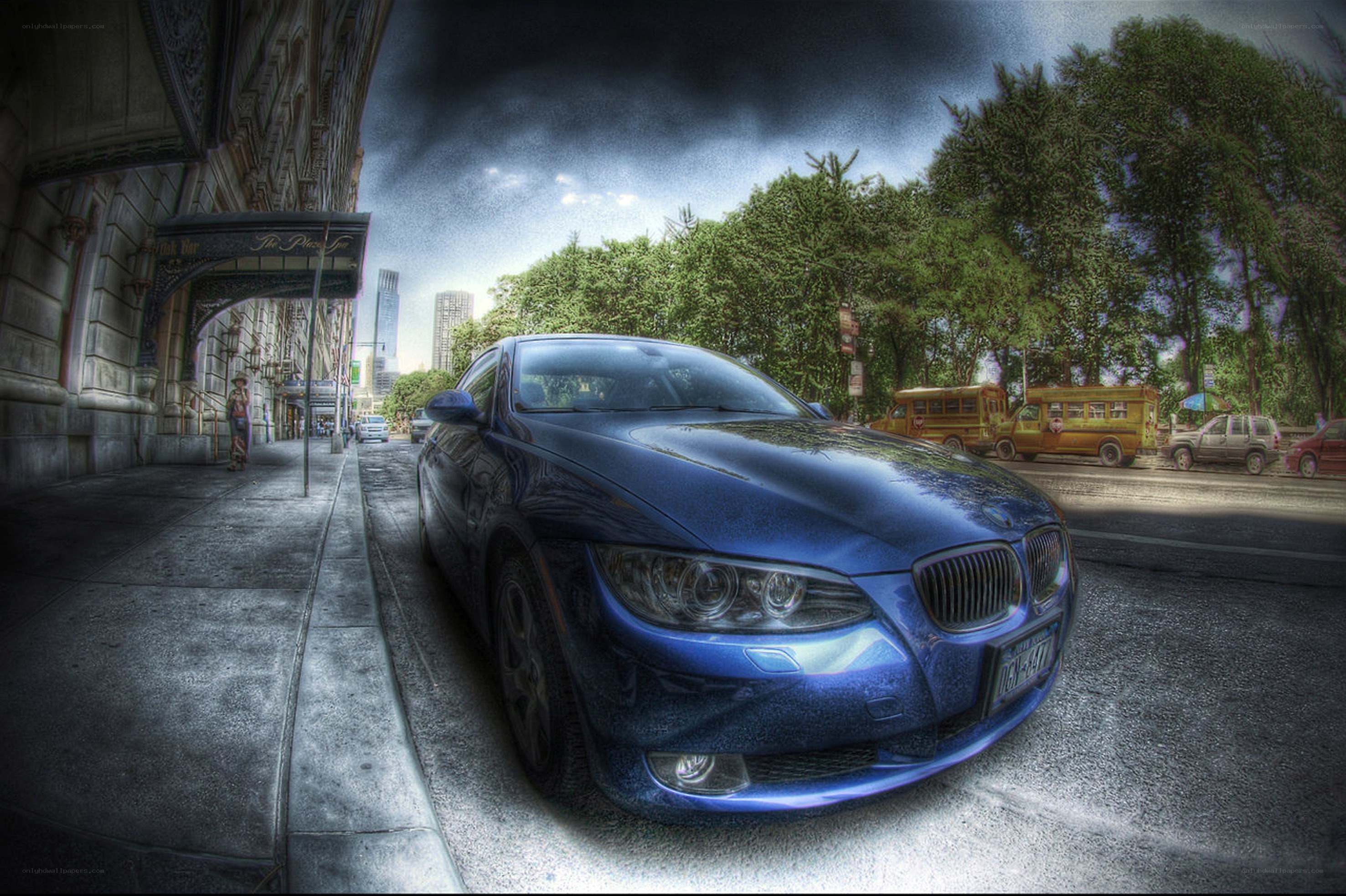 Blue BMW on city street