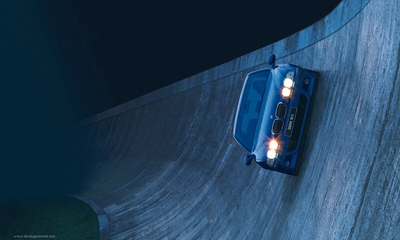 Blue BMW on curved track