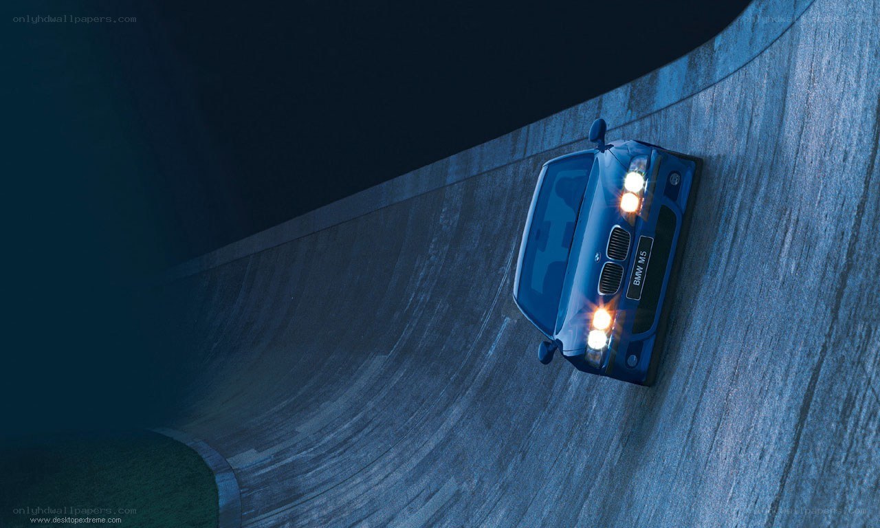 Blue BMW on curved track